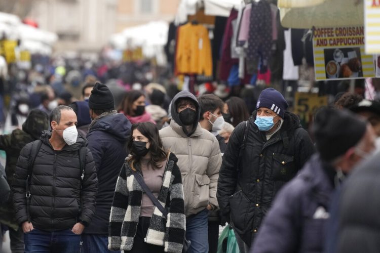 Fri. 9:03 a.m.: Mask rules get tighter in Europe in winter's COVID-19 wave